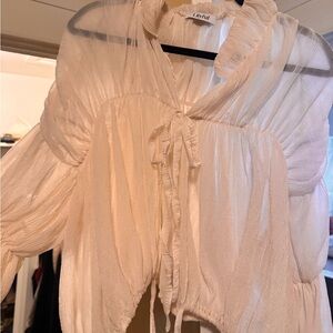 Lilyful Elegant Cream Blouse with Ruffle Accents